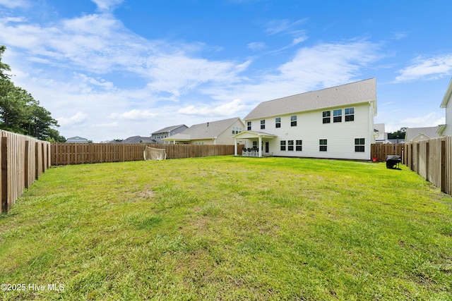 74 W Weatherbee Way, Hampstead, NC 28443 - back of house with a patio area