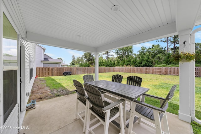 74 W Weatherbee Way, Hampstead, NC 28443 - view of patio featuring outdoor dining area