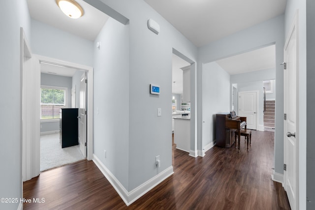 74 W Weatherbee Way, Hampstead, NC 28443 - hall with dark wood-style flooring and baseboards