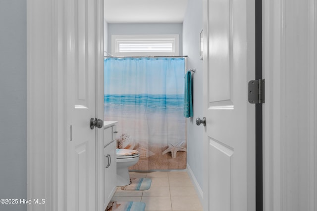 74 W Weatherbee Way, Hampstead, NC 28443 - bathroom with toilet and tile patterned flooring