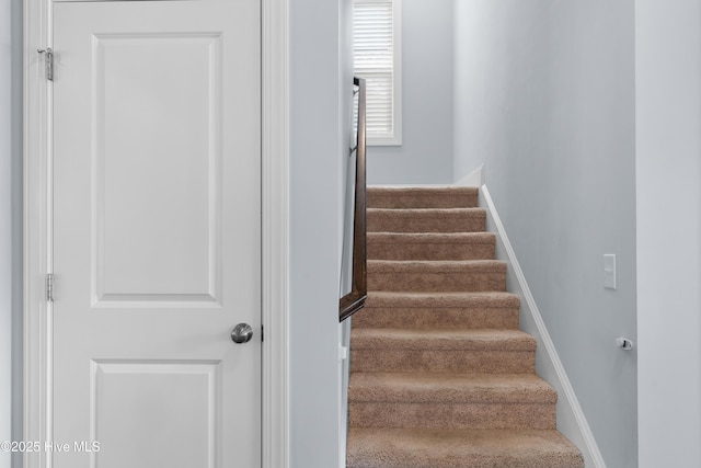 74 W Weatherbee Way, Hampstead, NC 28443 - stairway featuring baseboards