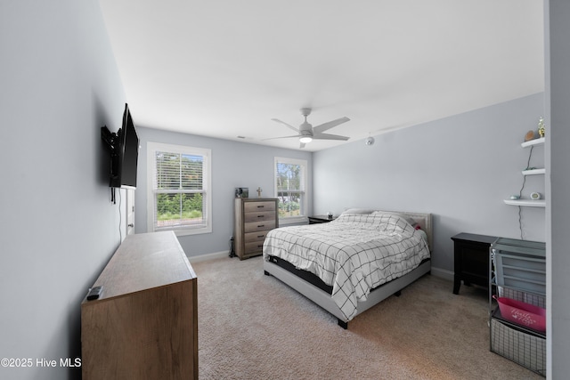 74 W Weatherbee Way, Hampstead, NC 28443 - carpeted bedroom featuring ceiling fan and baseboards