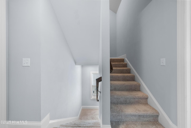 74 W Weatherbee Way, Hampstead, NC 28443 - stairs featuring carpet floors, baseboards, and vaulted ceiling