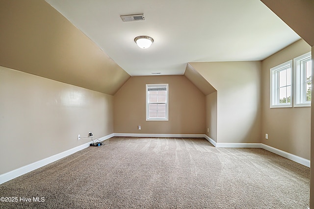 514 Everett Glades, Sneads Ferry, NC 28460 - additional living space with carpet flooring and vaulted ceiling