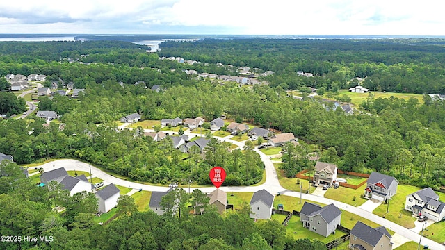514 Everett Glades, Sneads Ferry, NC 28460 - aerial view of property and surrounding area with nearby suburban area and a heavily wooded area