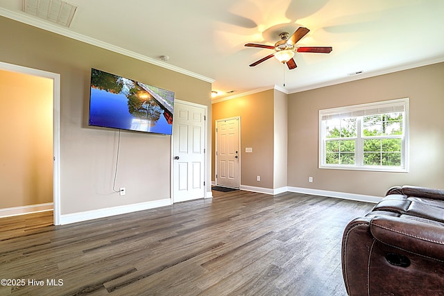 514 Everett Glades, Sneads Ferry, NC 28460 - living room featuring ceiling fan, dark wood finished floors, and ornamental molding