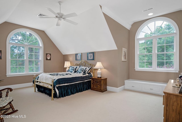 249 Maple Creek Dr, Wallace, NC 28466 - bedroom with vaulted ceiling, light colored carpet, multiple windows, and ceiling fan