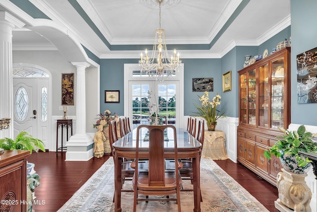 249 Maple Creek Dr, Wallace, NC 28466 - dining space with a chandelier, dark wood-type flooring, arched walkways, decorative columns, and crown molding