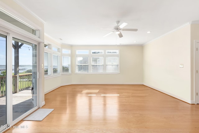 8630 Sound Dr Unit B2, Emerald Isle, NC 28594 - empty room with light wood-style floors, ceiling fan, ornamental molding, and recessed lighting