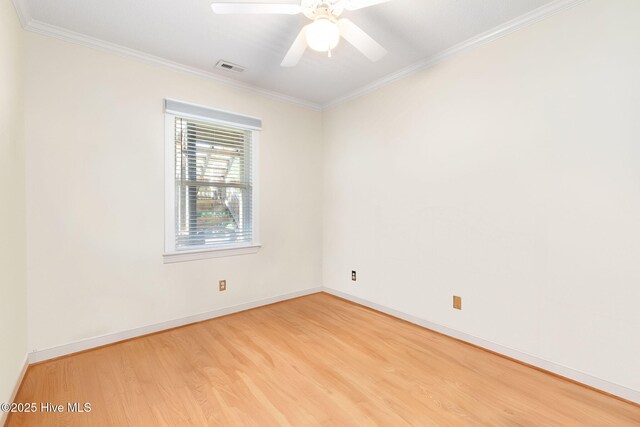 8630 Sound Dr Unit B2, Emerald Isle, NC 28594 - empty room with wood finished floors, ornamental molding, and a ceiling fan
