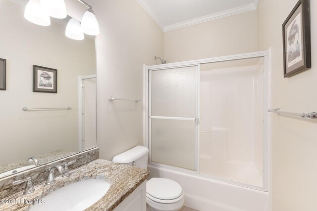 8630 Sound Dr Unit B2, Emerald Isle, NC 28594 - full bath featuring ornamental molding, vanity, and shower / bath combination with glass door