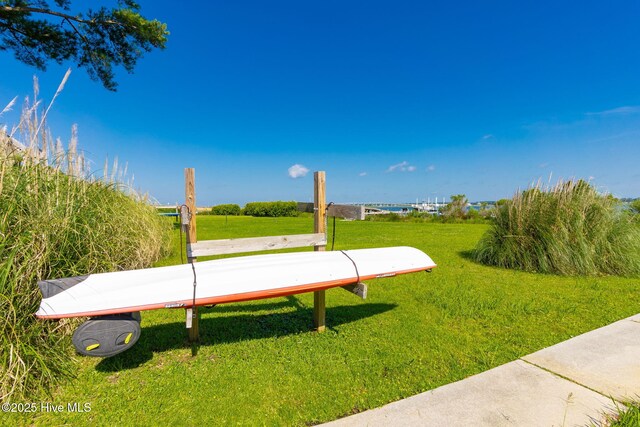 8630 Sound Dr Unit B2, Emerald Isle, NC 28594 - view of community featuring a yard