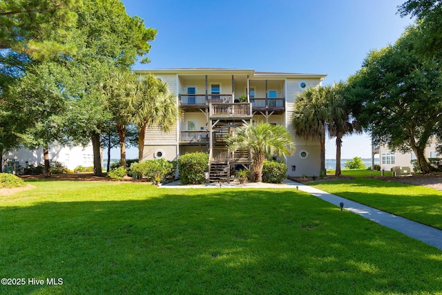 8630 Sound Dr Unit B2, Emerald Isle, NC 28594 - view of building exterior featuring stairs