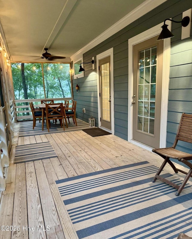 1044 Mill Creek Rd, Minnesott Beach, NC 28510 - wooden deck featuring a ceiling fan and outdoor dining space