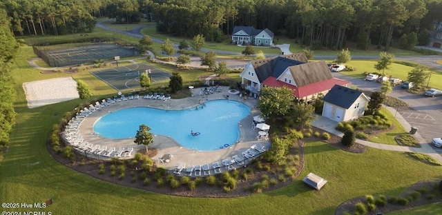 1044 Mill Creek Rd, Minnesott Beach, NC 28510 - drone / aerial view of a pool area and a heavily wooded area