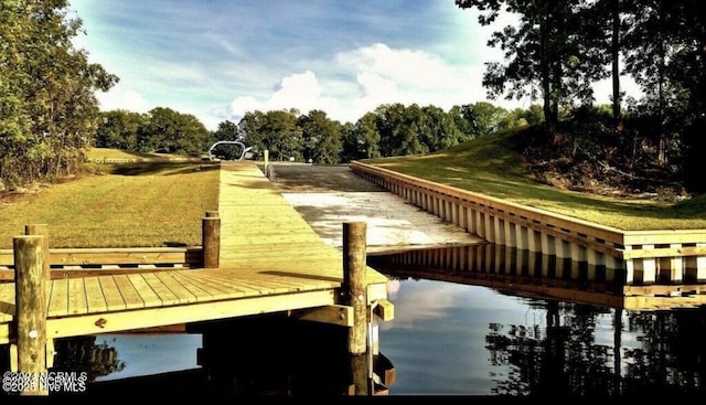 1044 Mill Creek Rd, Minnesott Beach, NC 28510 - dock area with a water view and view of wooded area