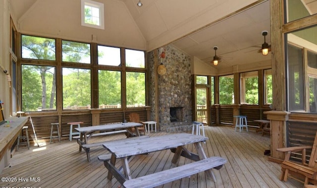 1044 Mill Creek Rd, Minnesott Beach, NC 28510 - sunroom / solarium with a wooden deck, wood-type flooring, and high vaulted ceiling