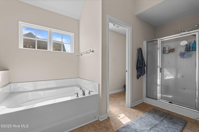 399 Highgrove Dr, Spring Lake, NC 28390 - full bathroom with a shower stall, a bath, tile patterned floors, and baseboards