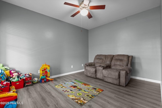 399 Highgrove Dr, Spring Lake, NC 28390 - rec room with wood finished floors, a ceiling fan, and baseboards