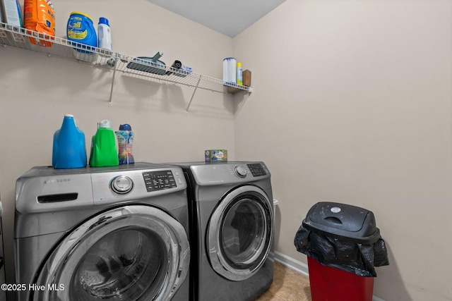 399 Highgrove Dr, Spring Lake, NC 28390 - laundry area with independent washer and dryer, baseboards, and tile patterned floors
