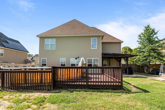 399 Highgrove Dr, Spring Lake, NC 28390 - rear view of house featuring a wooden deck and roof with shingles
