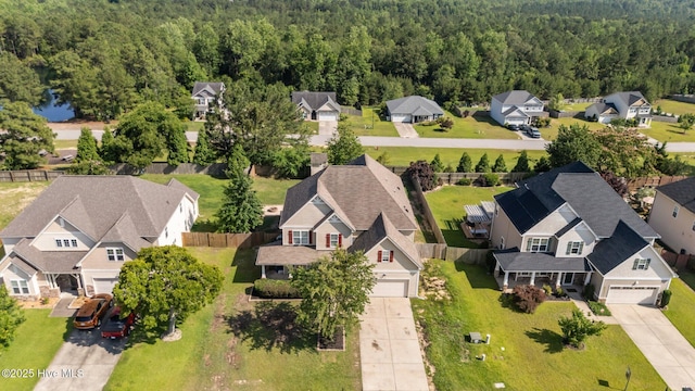 399 Highgrove Dr, Spring Lake, NC 28390 - aerial perspective of suburban area featuring a forest
