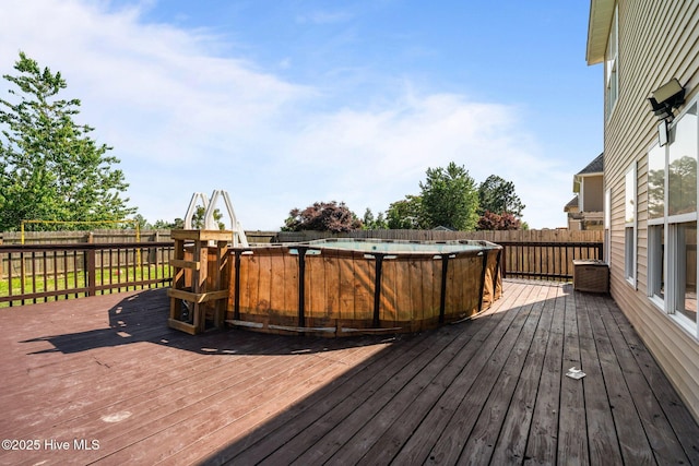 399 Highgrove Dr, Spring Lake, NC 28390 - deck featuring a fenced backyard