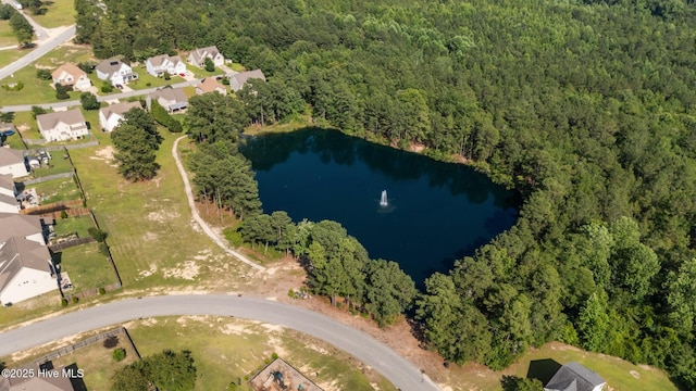 399 Highgrove Dr, Spring Lake, NC 28390 - aerial overview of property's location featuring a heavily wooded area, a nearby body of water, and nearby suburban area