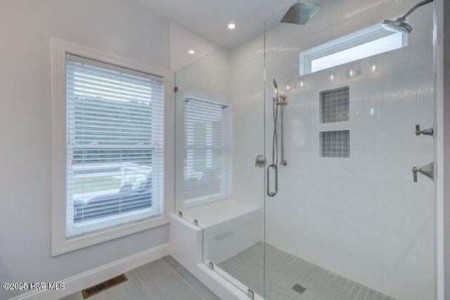 640 Avila Dr, Hampstead, NC 28443 - full bath with a shower stall, baseboards, and tile patterned flooring