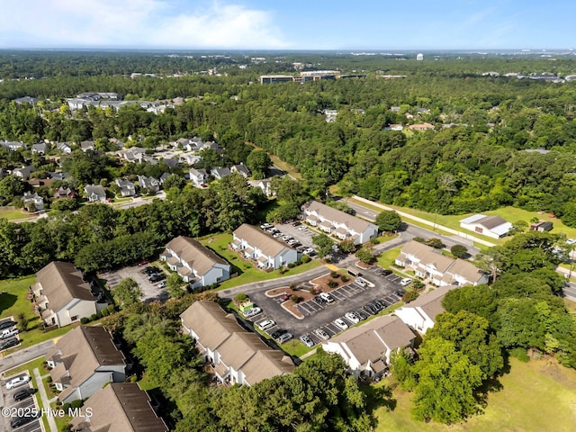 1703 41st St Apt B, Wilmington, NC 28403 - aerial view of property and surrounding area featuring a heavily wooded area and nearby suburban area