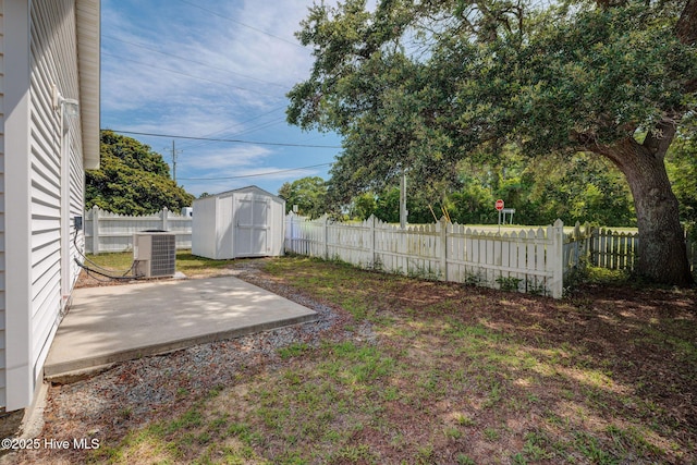 6901 Southern Exposure, Wilmington, NC 28412 - fenced backyard with a patio and central AC