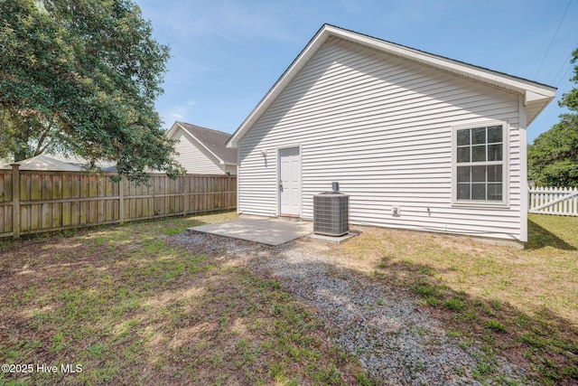 6901 Southern Exposure, Wilmington, NC 28412 - rear view of house with cooling unit and a patio area