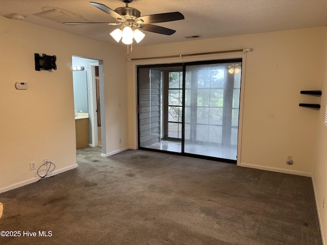 244 Clubhouse Rd Unit 3A, Sunset Beach, NC 28468 - unfurnished room with carpet floors, ceiling fan, and a textured ceiling