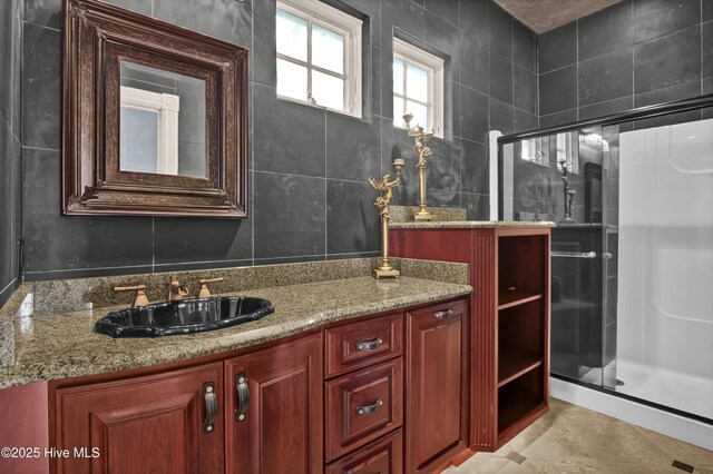3530 Van Buren St SW, Supply, NC 28462 - bathroom featuring a stall shower, vanity, tile walls, and tile patterned floors