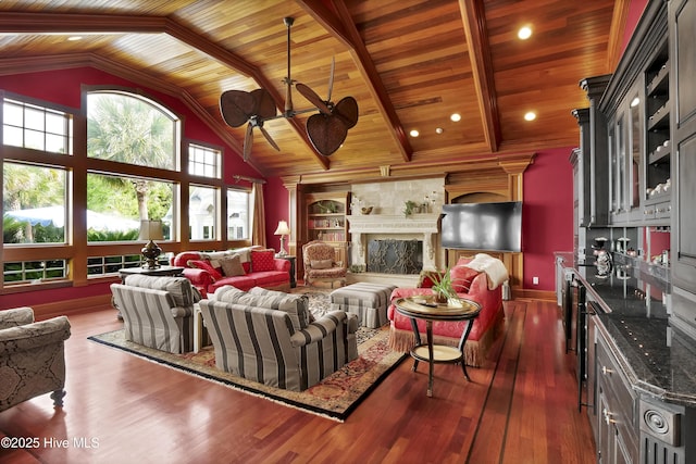 3530 Van Buren St SW, Supply, NC 28462 - living area featuring a wooden ceiling with exposed beams, a fireplace, ceiling fan, dark wood finished floors, and high vaulted ceiling