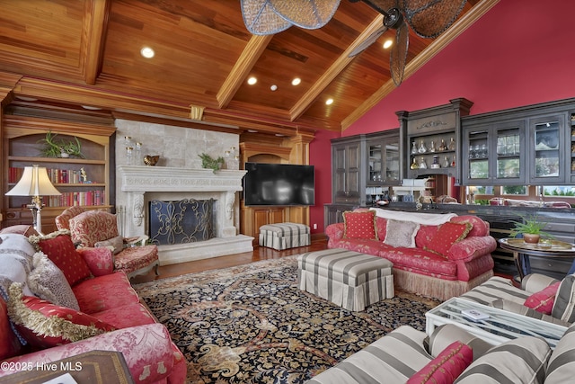3530 Van Buren St SW, Supply, NC 28462 - living area featuring a wooden ceiling with exposed beams, wood finished floors, a fireplace, and high vaulted ceiling
