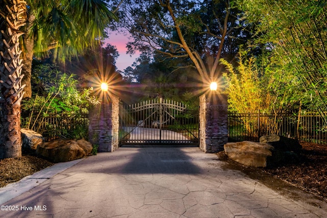 3530 Van Buren St SW, Supply, NC 28462 - view of gate at dusk