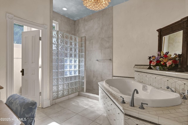 3530 Van Buren St SW, Supply, NC 28462 - full bath featuring a bath, a walk in shower, tile patterned flooring, and a chandelier