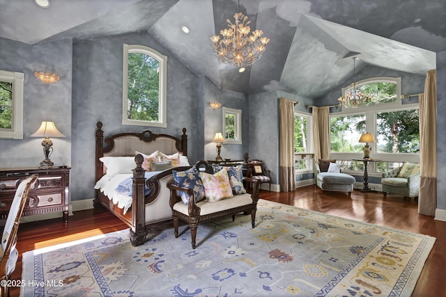 3530 Van Buren St SW, Supply, NC 28462 - bedroom with wood finished floors, vaulted ceiling, and a chandelier