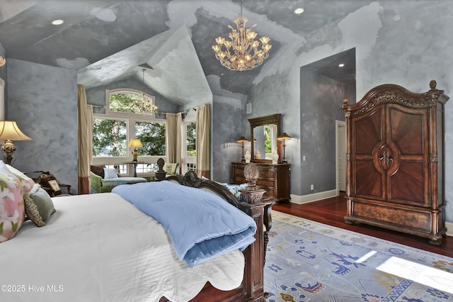 3530 Van Buren St SW, Supply, NC 28462 - bedroom with wood finished floors, vaulted ceiling, and a chandelier