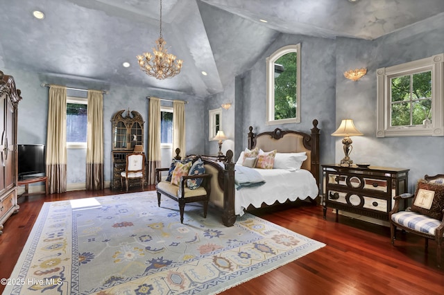 3530 Van Buren St SW, Supply, NC 28462 - bedroom featuring multiple windows, wood finished floors, a chandelier, and lofted ceiling