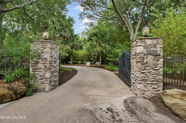 3530 Van Buren St SW, Supply, NC 28462 - gate featuring view of wooded area
