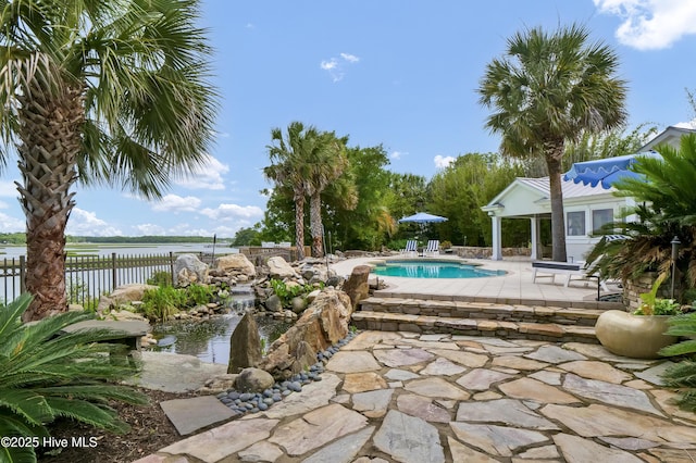 3530 Van Buren St SW, Supply, NC 28462 - view of swimming pool featuring a patio