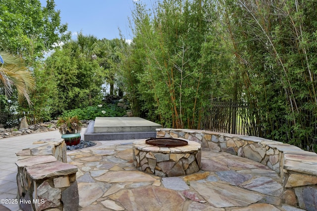 3530 Van Buren St SW, Supply, NC 28462 - view of patio / terrace with an outdoor fire pit