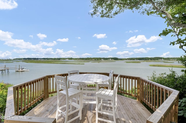 3530 Van Buren St SW, Supply, NC 28462 - wooden deck with a water view and outdoor dining space
