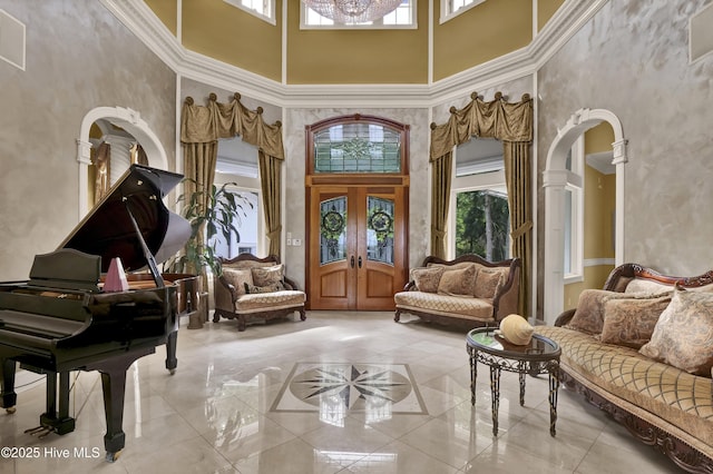 3530 Van Buren St SW, Supply, NC 28462 - living area featuring a high ceiling, arched walkways, and french doors