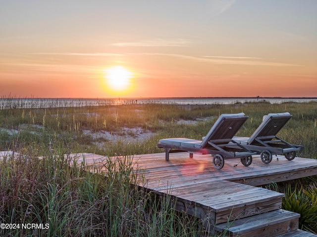 224 W Bald Head Wynd Wynd, Bald Head Island, NC 28461 - deck at dusk with a water view