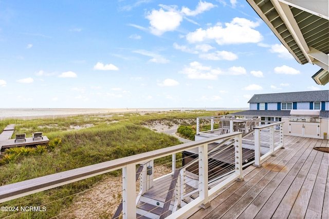 224 W Bald Head Wynd Wynd, Bald Head Island, NC 28461 - wooden terrace with view of water and beach and grilling area