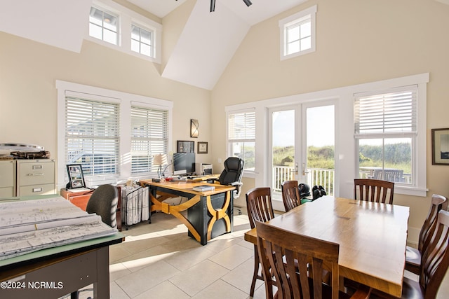 224 W Bald Head Wynd Wynd, Bald Head Island, NC 28461 - dining room with french doors, a towering ceiling, ceiling fan, an office area, and light tile patterned floors