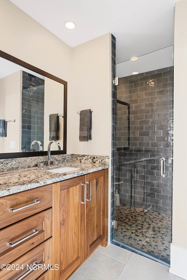 224 W Bald Head Wynd Wynd, Bald Head Island, NC 28461 - full bathroom with vanity, tile patterned flooring, a shower stall, and recessed lighting
